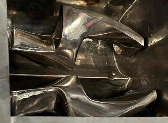 double ∑-type blades: specifically designed for the high-intensity dispersion and mixing of silicone raw rubber and fumed silica close-up of internal ∑-type mixing blades in sigma blade mixer—high-shear, high-viscosity mixing